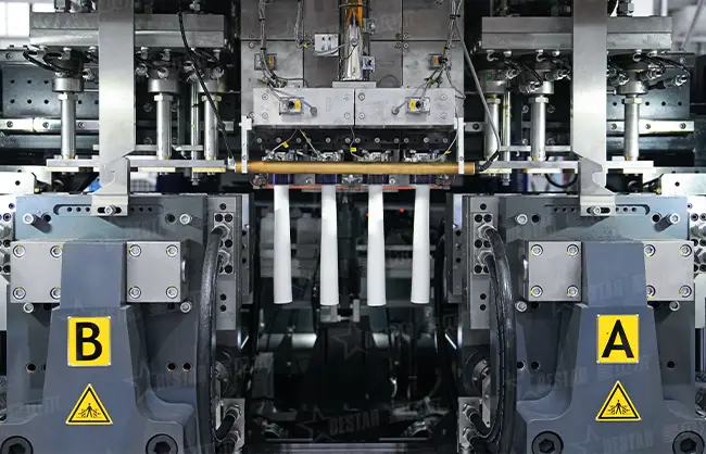 Single Station vs. Double Station Blow Molding Machine